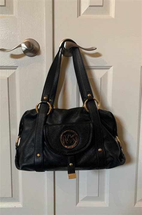 michael kors old style handbags|michael kors pre owned.